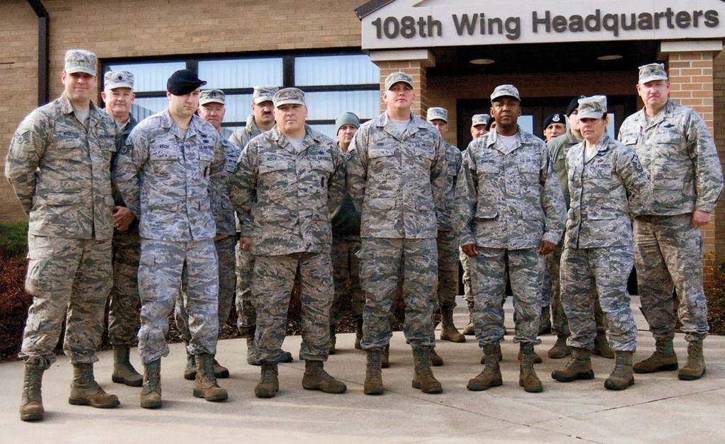 Six re-enlist at years-end Surrounded by their supervisors, six 108th Wing Airmen reenlisted Dec.