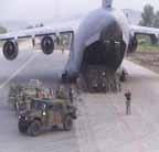 C-17s delivered Army and Air Force equipment and personnel to Albania as part of a vast inter -national refugee aid effort.