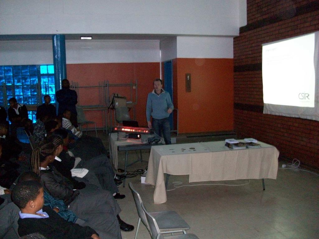 4. Visiting Lecturer: Roelf Botha gives students a laser demonstration.