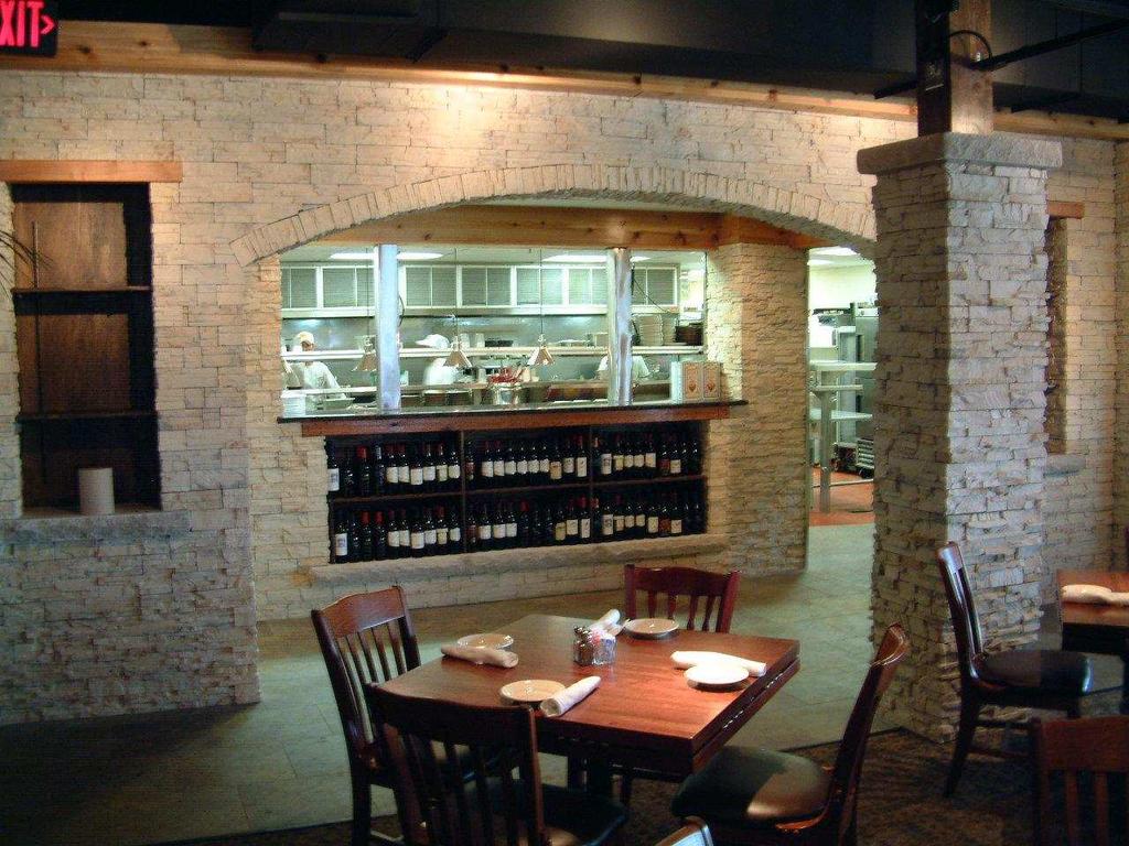 4.4 Attract and Retain Businesses Jameson s Charhouse interior dining room Establish marketing efforts to attract and retain businesses throughout the City.