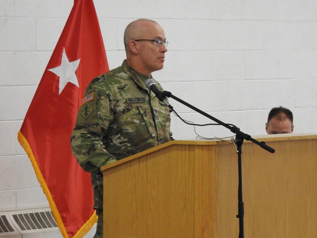 Photo #4 COL Hallenbeck addresses the Staff and guests during Camp Grayling Joint Maneuver