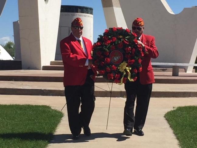 Carmella Miller, and Joe V. Martinez who laid the wreath at the monument.