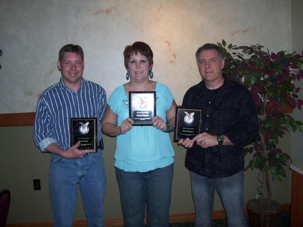 Awards Given Scott Neyens, Brad Kruse, and Cheryl Neyens were awarded with plaques for their years of service for