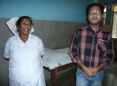 Nursing staff outside the Hospital Sister Awaddya and Dr