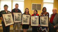 Presentation of Boyd print to local school principles sented framed copies of artist Wilbur Kurtz s rendition of the death of British General Boyd after the battle to school administrators (from