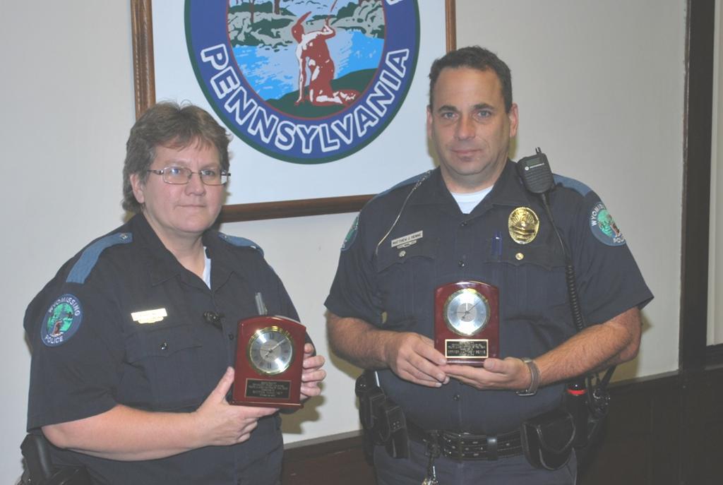 Yoch with the 2013 Police Officer of the Year award.
