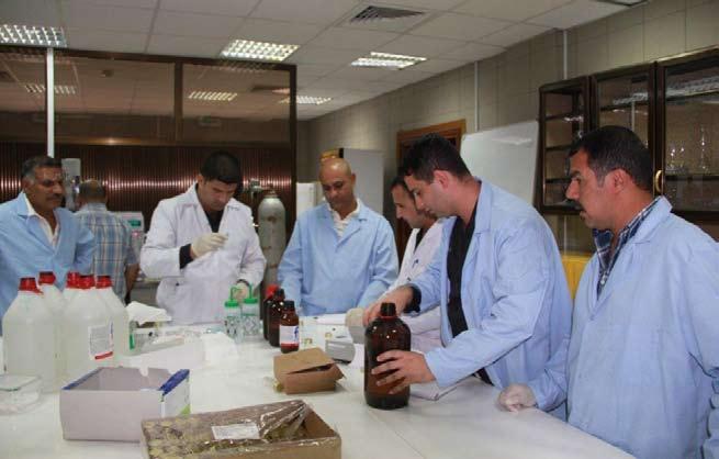 CSI: BAGHDAD Photo by Chris Binion Iraqi chemists participating in a training program at the National Iraqi Forensic Training Laboratory, here, developed their first analytical procedure and