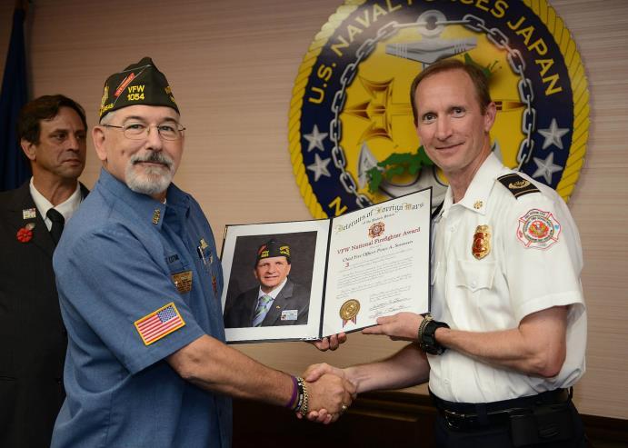 VFW Post 1054 and District 2 Adjutant Mike Lutman read the certificate and congratulated Chief Sorenson on behalf of National Commander Bill