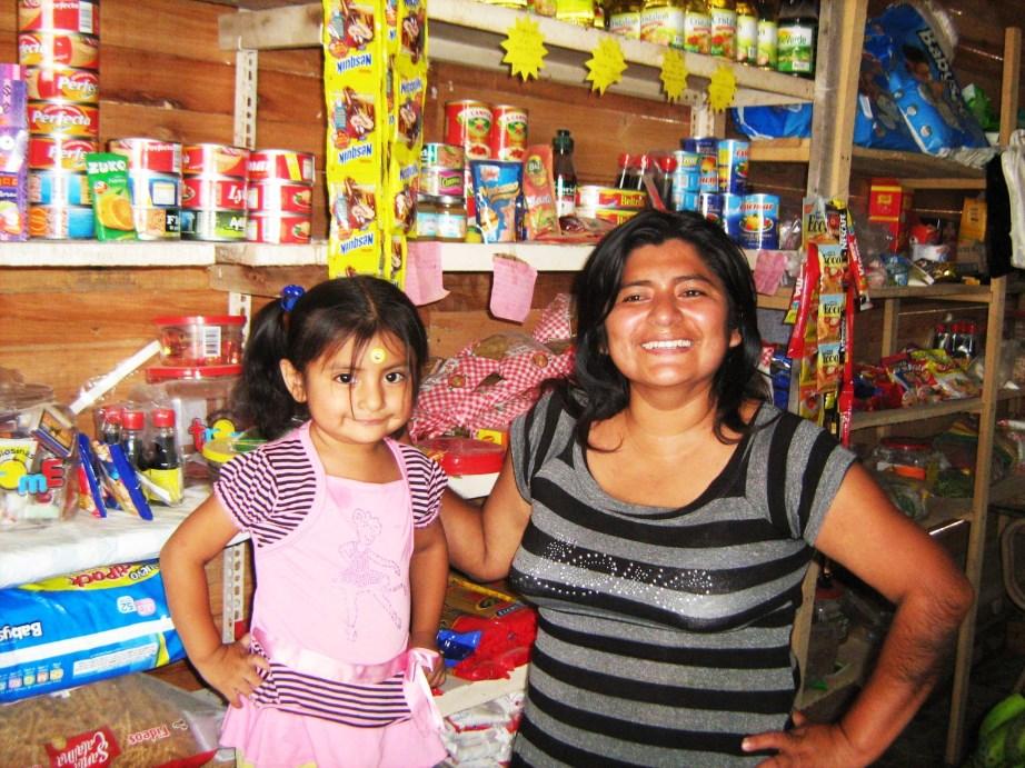 She began selling fish locally as well as raising hogs, trying to ensure the basic needs of her family. However, with little capital, her business ventures were severely limited.