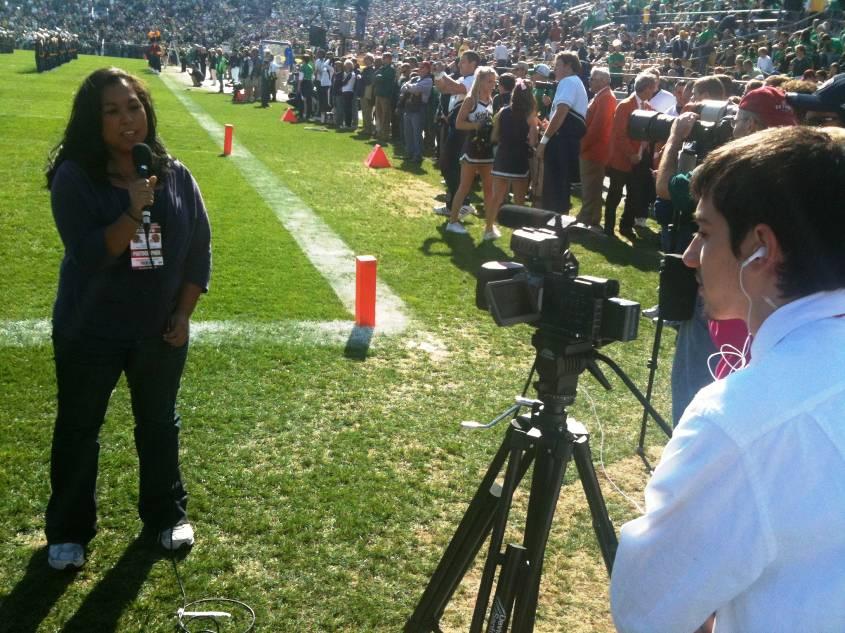 Pictured is Mike shooting Rachel's sideline reporting at the game won by Notre Dame 44-20 over Western