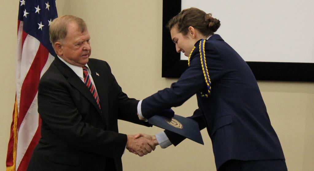 , presents ROTC Leadership Award to Cadet Anna E. Britton, UCF Air Force Det. COL Kent Miller, USA, Ret.