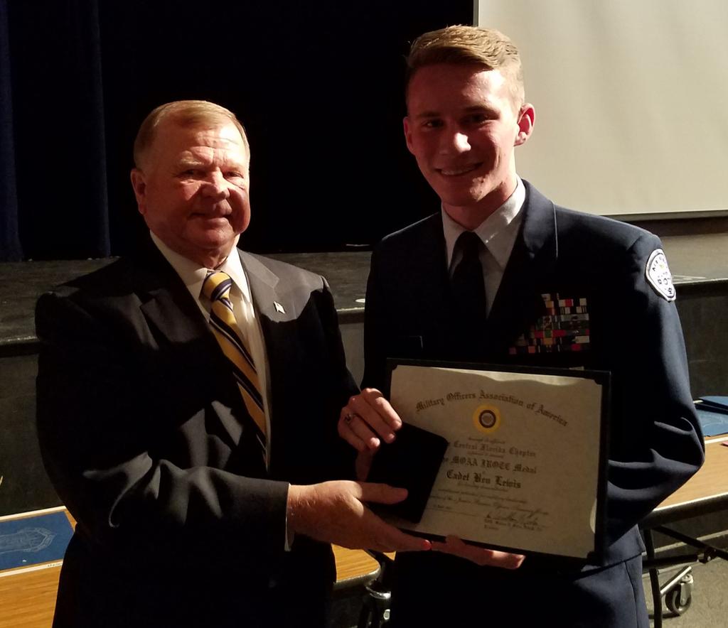 Lt Col Joe Hines, USAF, Ret presents JROTC Leadership Award to Cadet 1LT Hanna Harman, Wekiva High School.