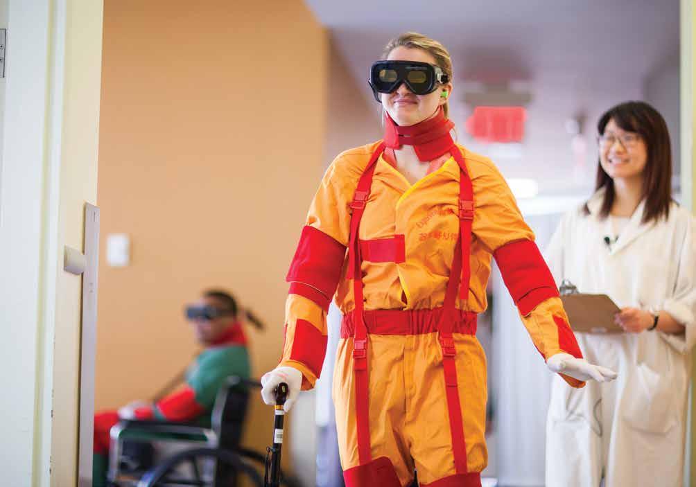3 BE A SYSTEM LEADER FOR HEALTH HUMAN RESOURCE SOLUTIONS Photo: A student wears the frail aging simulation suit as part of the Working With