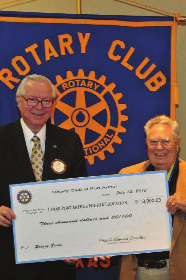 PORT ARTHUR CLUB SUPPORTS EDUCATION Dr. Sam Monroe, President of Lamar College Port Arthur receives a $3,000 check from the Rotary Club of Port Arthur from Club President, George Newsome.