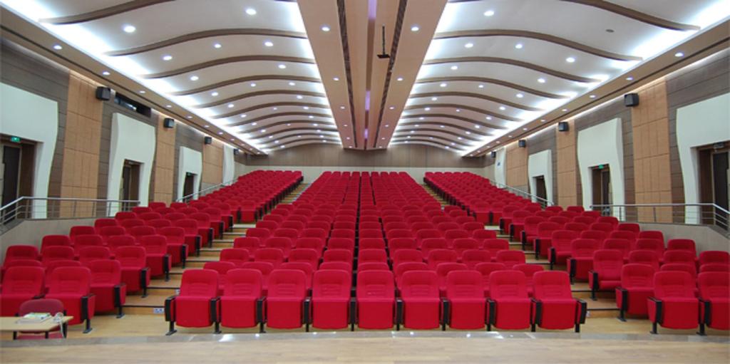 Auditorium: Air-conditioned with acoustics of International standard with seating capacity of