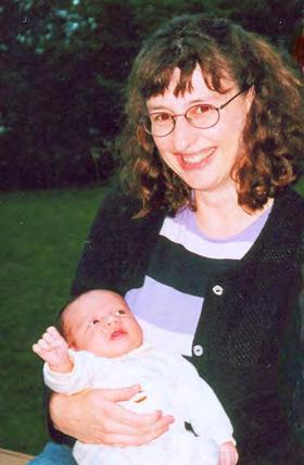 Michael Brown captured this portrait of Prof. Antonia Foias and her second child, Emmanuel, at a September 2002 cookout. Antonia was promoted to Associate Prof.