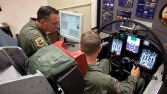 3 A senior U-2 pilot helps a potential program applicant become familiar with the U-2