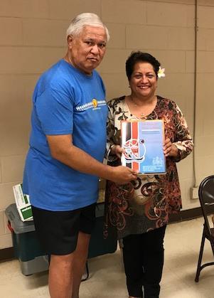 PHHCC s Nominee for Outstanding Hawaiian Civic Club Member 2017 President Charles Kapua presents U'ilani Kuie'e a Convention Booklet and a Songbird of Hawai'i Lena