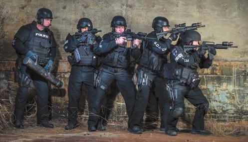 Photo by Jack Palmer THE ROCKWALL SWAT TEAM consists of Unit Operators, a Team Leader, a Team Commander, a Containment Team, and a Hostage Negotiations Team who assist during crisis situations.