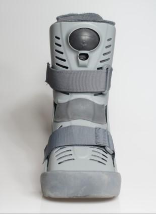A patient fractured their foot and required a cast boot.