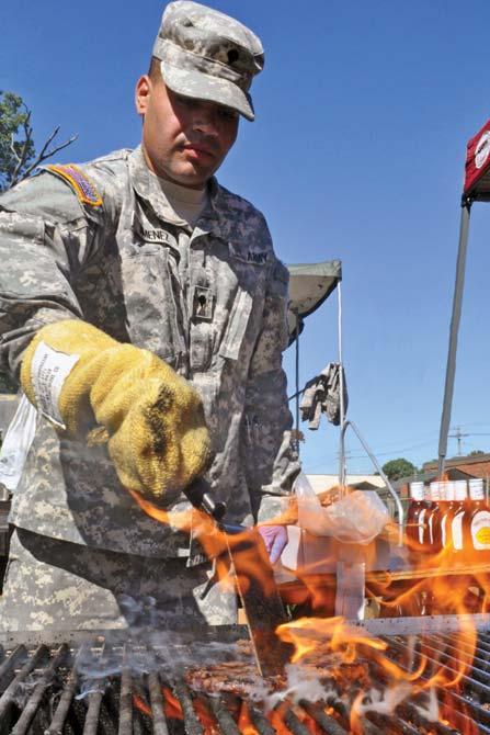 Carlos Jimenez; 1-224th Service and Support Company; New Jersey Army National Guard, cooks burgers.