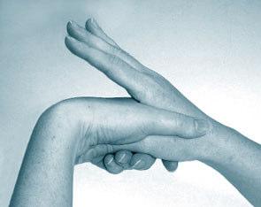 backwards and forwards, with fingertips on opposing hand.