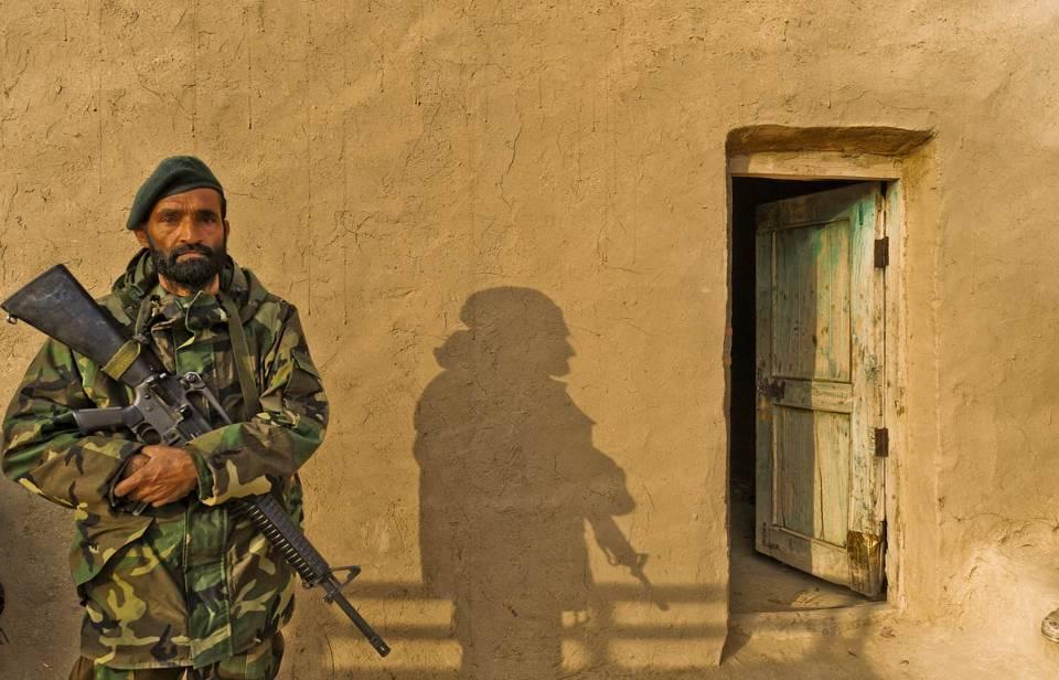 An Afghan National Army soldier provides security during a joint patrol in Shabila Kalan, Zabul Province, Afghanistan, Nov. 30, 2009.