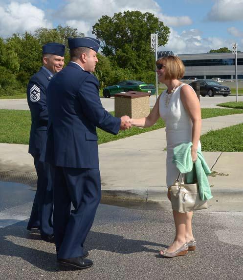 Thomas Mazzone, 6th AMW command chief, greet Congresswoman Kathy Castor, United States Representative, 14th District of Florida, at MacDill Air Force Base, Aug.9.
