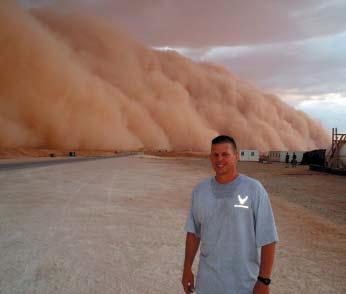 NEWS Dusty duty With a massive sand storm fast approaching, Tech. Sgt.