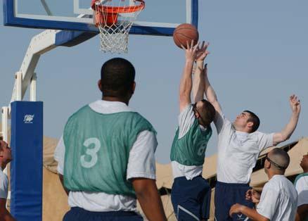 Page 8 Ali Base holds March Madness 4-on-4 tourney Left: Airman