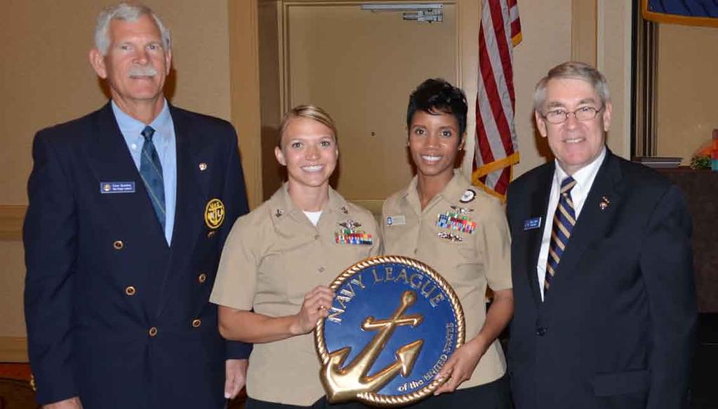 Petty Officer 2nd Class Aimee Granger, tactical readiness trainer, Combat Logistics Regiment 17, 1st Marine Logistics Group, receives the Navy League s 51st Enlisted Woman of the Year award at the