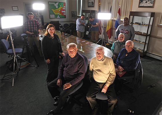 The crew and Veterans featured in VA s web series Living History: Battle of the Bulge. Photo by Robert Turtil, VA.