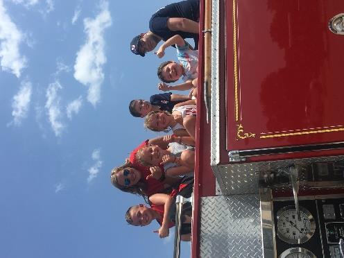 Fire Department personnel met with children at Clive Learning Academy day program to speak about fire safety and let them experience the awe of fire apparatus.