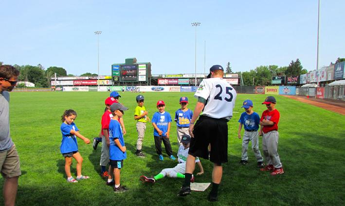IN THE COMMUNITY cont... CLINICS The Lake Monsters host several clinics for kids every summer at Centennial Field.