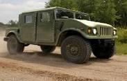 Expanded Capability Vehicle (ECV2) restores the HMMWV payload lost to armor, but at the cost of reduced transportability.