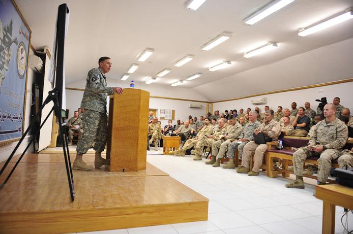 Roy speaks with Airmen stationed at Camp Phoenix, Afghanistan, June 24, 2010, about their mission in support of Operation Enduring Freedom. (U.S.