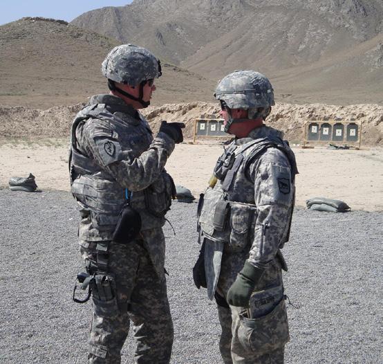 196th Maneuver Enhancement Brigade Soldiers Maj. Jeffrey Koepke, operations officer (left), and Lt. Col.