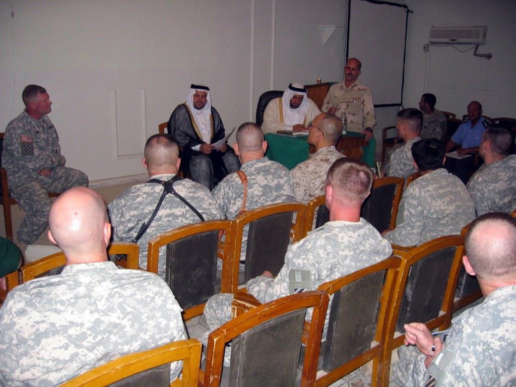 A UMT hosts religious leaders who share with brigade leadership religious and cultural insights impacting mission success (Ramadi, Iraq 2007).