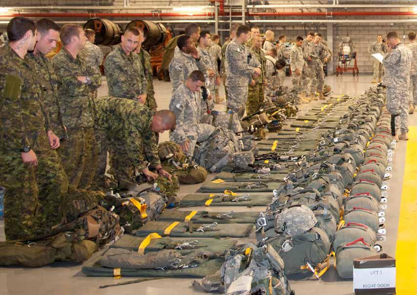 Paratroopers from C Company, 1st Battalion (Airborne), 503rd Infantry Regiment, 173rd Airborne Brigade Combat Team, and Canadian paratroopers from the 3rd Battalion, Princess Patricia s Canadian