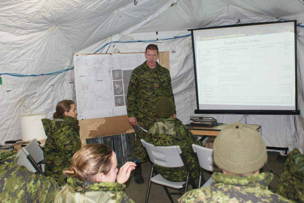 1 CMBG G3, Maj Rutland leads HQ Staff through a planning cycle during Exercise PROGRESSIVE RAM, Wainwright Patricias make up a substantial part of Headquarters 1 Canadian Mechanized Brigade Group