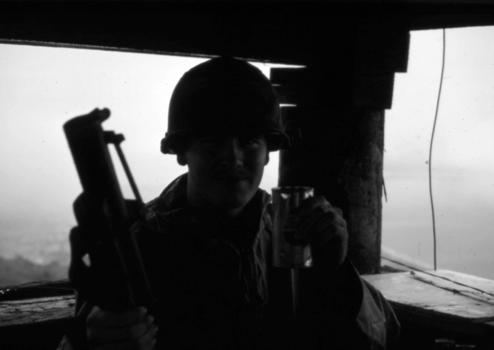 Soldier with M79 on Vung Chua Mountain Bunker firing tracers on Vung