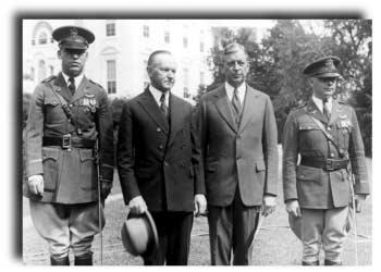 Calvin Coolidge and Secretary of War Dwight Davis honor left, Lt Lester J. Maitland and right, Lt Albert F.