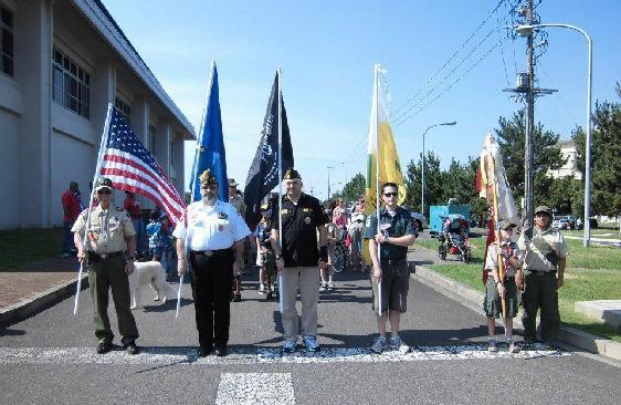 VFW Post 9612, Venturing Crew 22, Boy Scout Troop 22, Cub Scout 22, and Girl Scouts march during NAF Atsugi Independence Day Parade 04