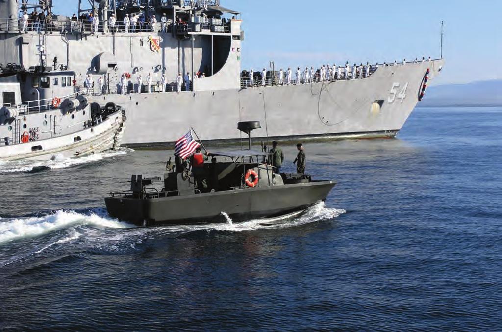 This restored and fully-operational PBR owned, operated, and exhibited by the Northwest Chapter of Gamewardens, an affiliate of the Vietnam Veterans of America escorts the Navy frigate U.S.