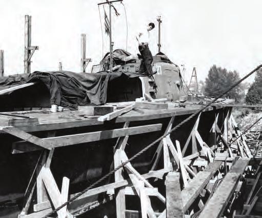 PT-27 is shown undergoing major repair at the Olsen & Winge Marine Works in Ballard during the winter of 1943.