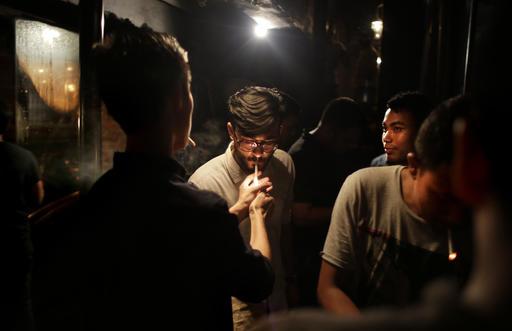 10, 2016 photo, Indians dine at Social, a three-story destination on the edge of Hauz Khas Village, one of the most popular nightlife neighborhoods in New Delhi, India.