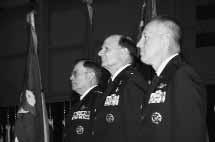DAYTON, Ohio (From left) Air Force Chief of Staff Gen. John P. Jumper presides over the Air Force Materiel Command change of command from Gen. Gregory S. Martin to Gen. Bruce Carlson on Aug.
