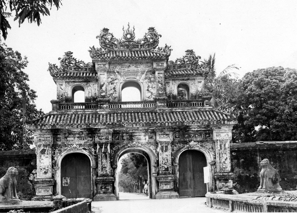 Perfume (Huong) River Hue Above Center: Aerial view of Hue City Left: The gate to the inner wall of the