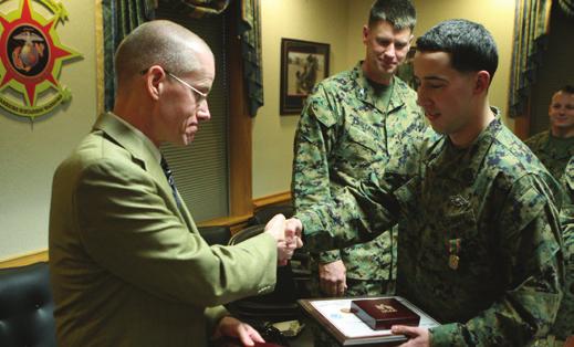 during an annual award ceremony. Marines, Sailors receive recognition after year-long efforts 2nd MLG Public Affairs CA