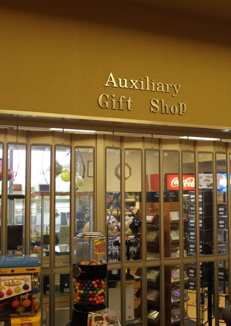 Gift Shop The QEII Auxillary Gift Shop has a variety of gifts, snacks, reading materials, and flowers and money raised is donated